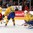 TORONTO, CANADA - DECEMBER 31: Sweden's Linus Soderstrom #30 makes the save as Robin Norell #5 battles with Switzerland's Luca Fazzini #21 and Sebastian Aho #2 looks on during preliminary round action at the 2015 IIHF World Junior Championship. (Photo by Andre Ringuette/HHOF-IIHF Images)

